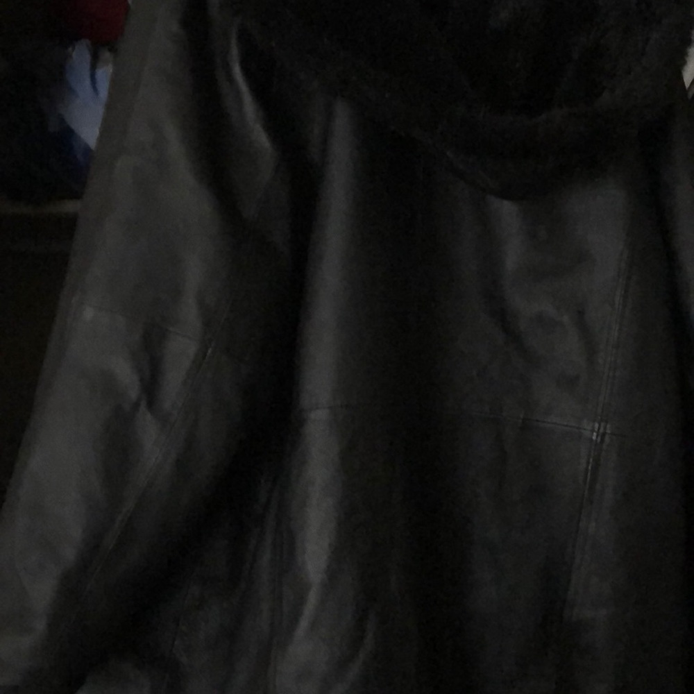 Reversible genuine leather and faux fur coat